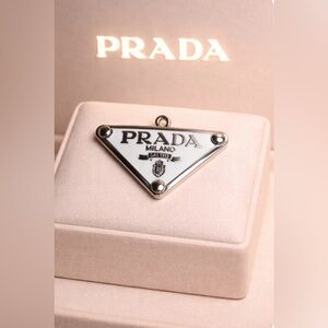 Prada stamped luxury White and Silver pendant charm/ zipper pull - NEW